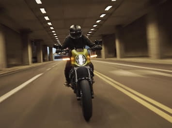 Motorcycle riding through a tunnel